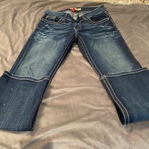 BKE culture brand  dark blue distressed denim jeans.